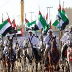 خادم الحرمين الشريفين الملك سلمان يشارك قيادة الإمارات في إحتفال مسيرة الإتحاد في اليوم الوطني 45